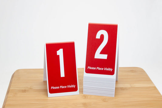 6in tall tent style red table numbers.