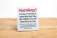 These plastic, L style food allergy signs reminds customers to inform staff if they have any food allergies or dietary restrictions before placing their order.  Food allergy signs are ideal for use in any food service establishment.