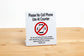 No cell phone use at counter signs politely reminds customers to please end and calls or texts before approaching the service counter. These plastic L style signs are easy to display on counters, desks and table tops.