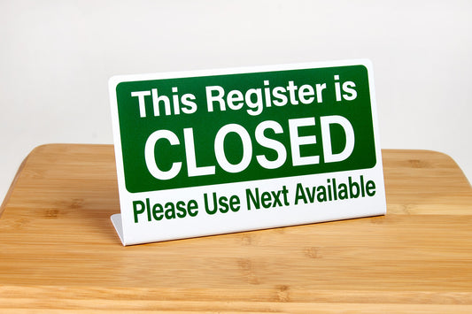 Register closed L style plastic signs for use in checkout and payment areas in retail business environments.
