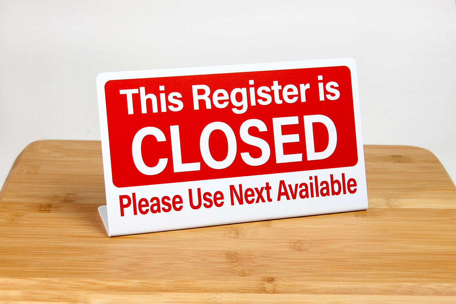 This register is closed L style signs are perfect for use in any retail setting such as grocery stores, and c-store.  These register closed signs feature a red color bar with easy to read text.