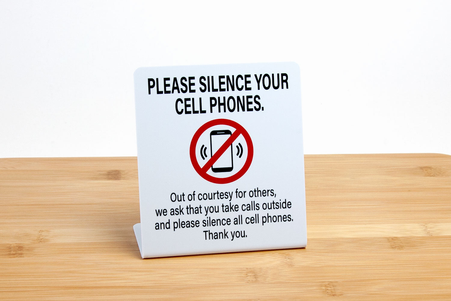 Silence cell phone signs provide a polite reminder to please silence cell phones and take calls outside. These L style signs are easy to display on counters, desks and tables.