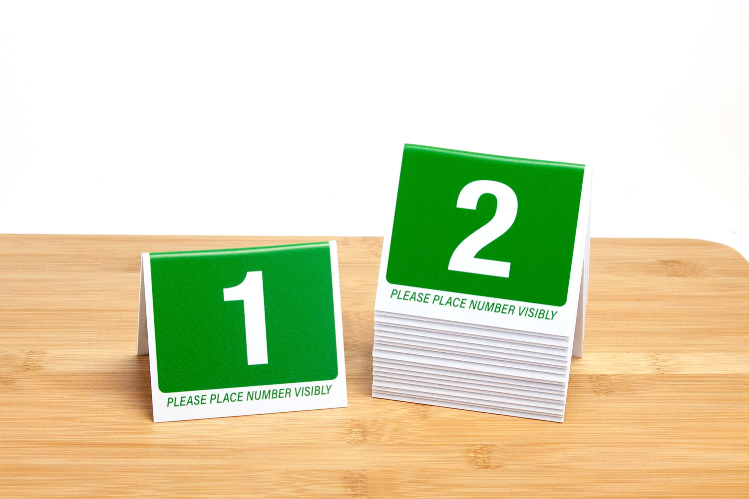 3" tall standard green table number tents. Tent style table numbers for the restaurant and food service industry.