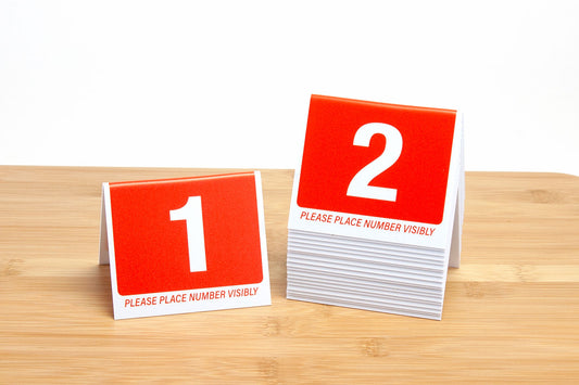 3" tall orange table numbers. Bold white numbers are printed on both sides for easy visibility in busy restaurant environments.